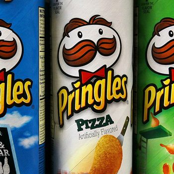 Three Pringles cans with Pringles logo