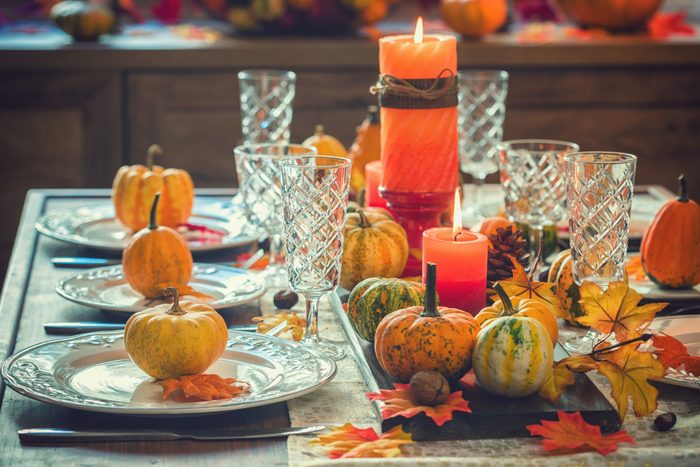 Thanksgiving Dining Table Place Setting with Autumn Decoration