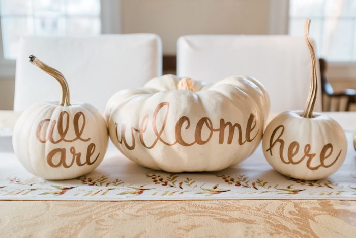painted white pumpkins for fall dining home decor