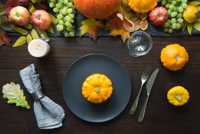 Fall table place setting with dark dinner plate