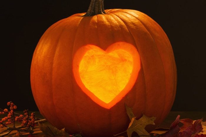 Halloween pumpkin carved in a heart shape