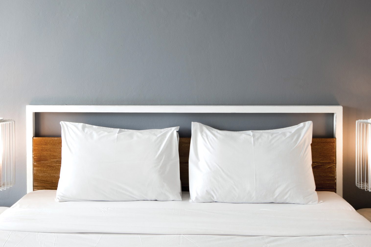 What Should You Do With Your Bed's Throw Pillows When You Sleep?