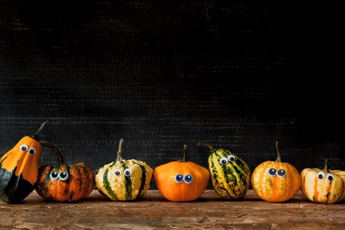 mini pumpkins with googly eyes decorations