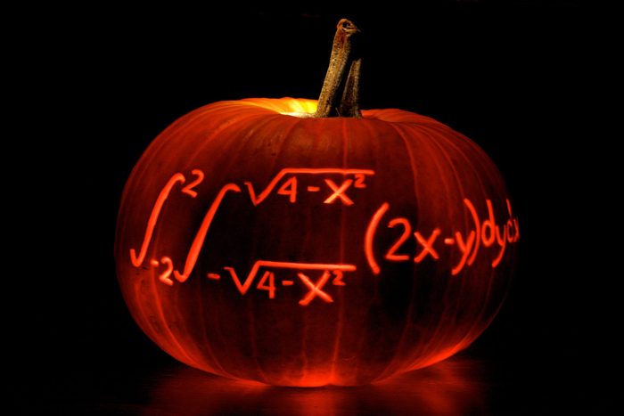 Carved pumpkin with math equation