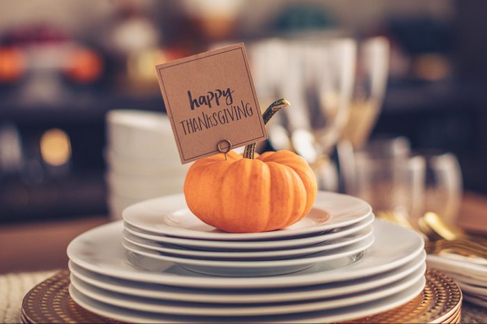 pumpkin name card holder on dinner table