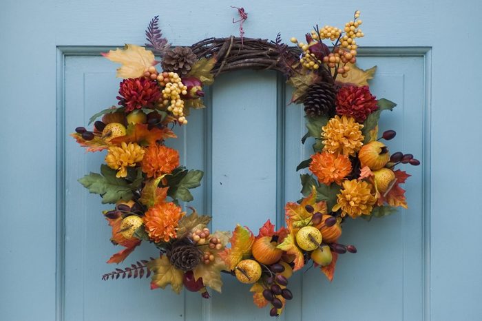 Thanksgiving wreath on a blue door