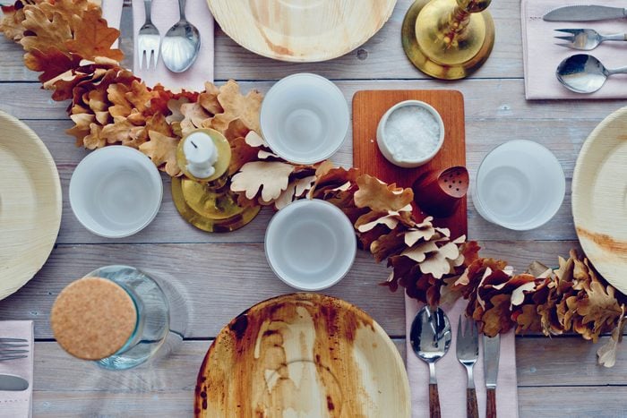 thanksgiving dinner table with leaf garland