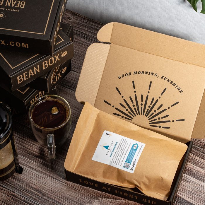 Bean Box Coffee Bag Subscription 1 Bag W Packaging on wood surface