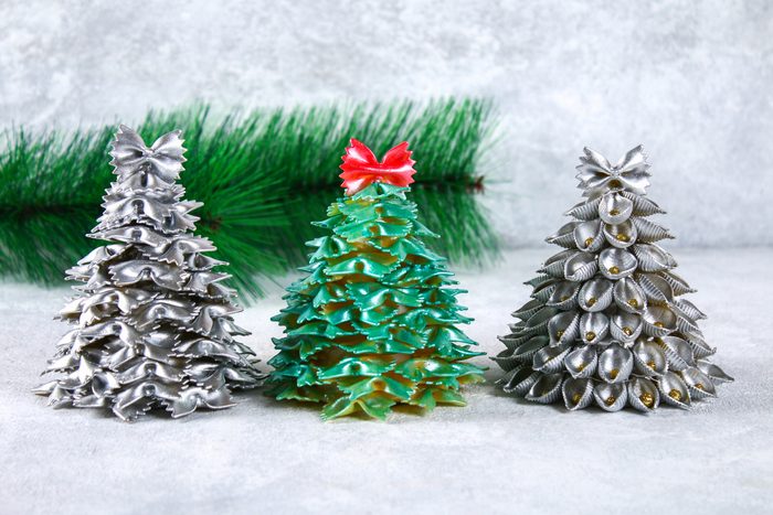 Christmas trees made from pasta, cardboard plates, hot glue and paint or spray