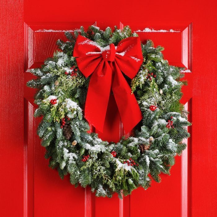 christmas wreath hanging on front door