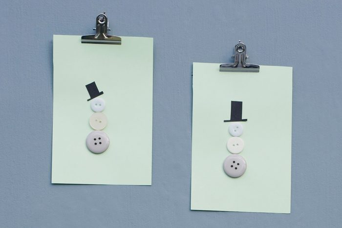Snowmen made of buttons on cards