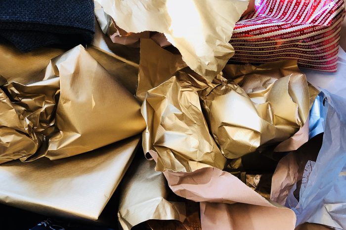 pile of used, crinkled wrapping paper from opened presents