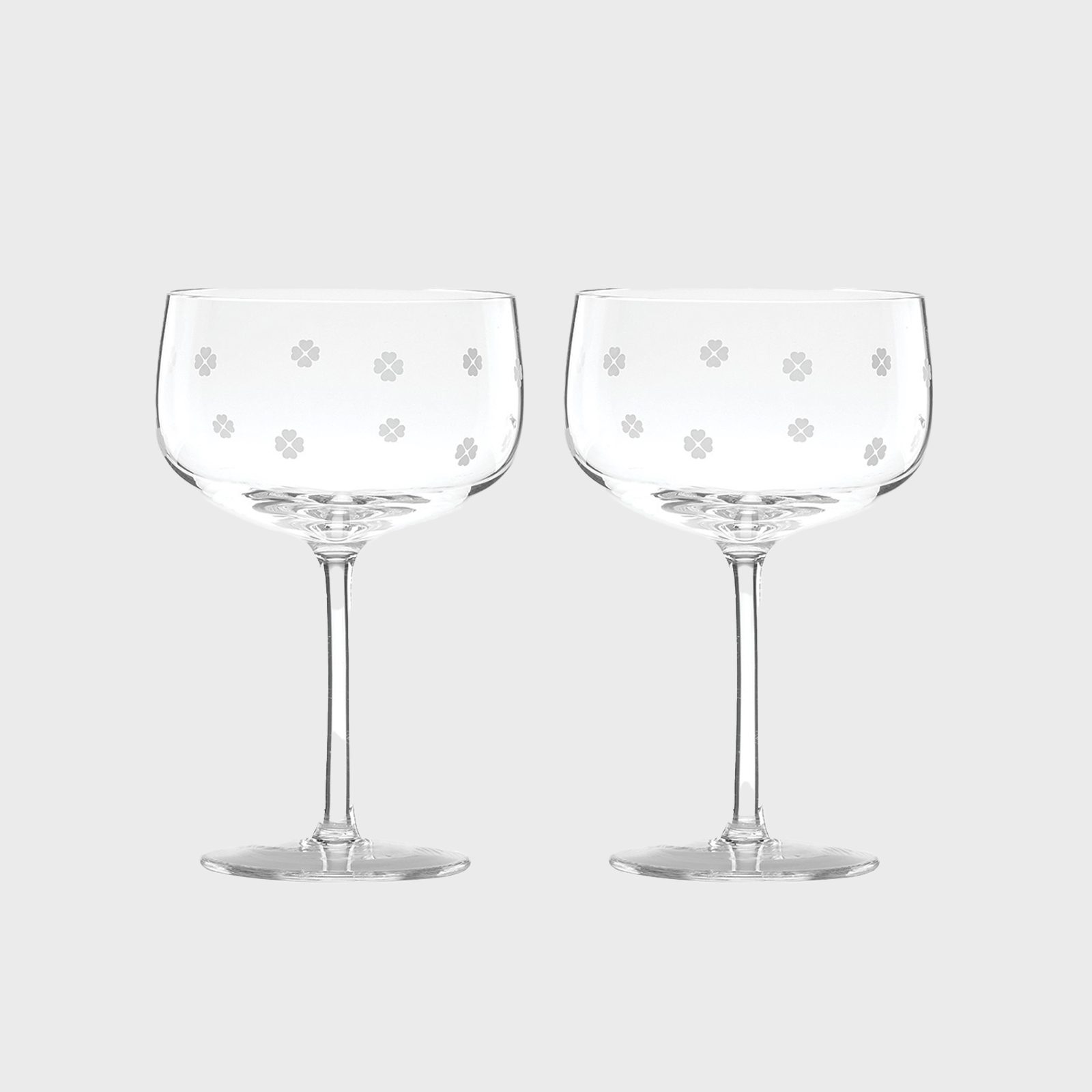 https://www.rd.com/wp-content/uploads/2021/10/Kate-Spade-New-York-Spade-Clover-Champagne-Coupe-Glasses-via-macys.jpg?fit=700%2C700