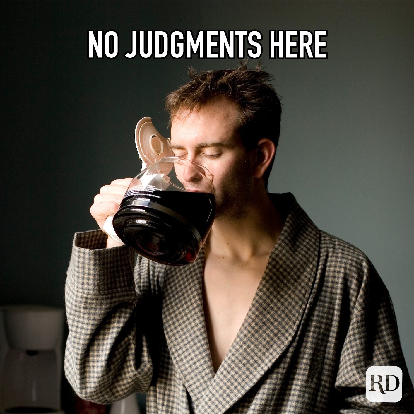 No Judgements Here meme text over image of man in robe drinking coffee from coffee pot