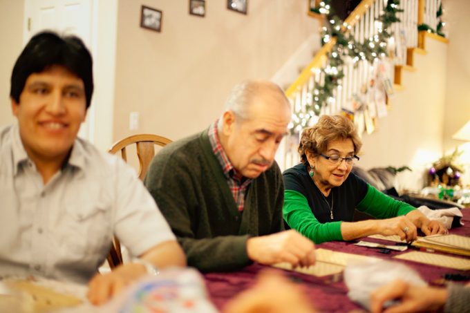 family playing bingo during the holidays