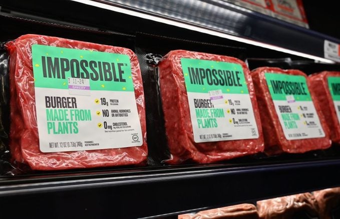 "Impossible Foods" burgers on a shelf in a grocery store