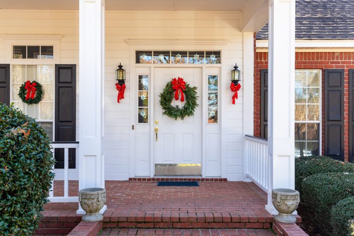 Front Porch and door decorated for the Christmas holiday season