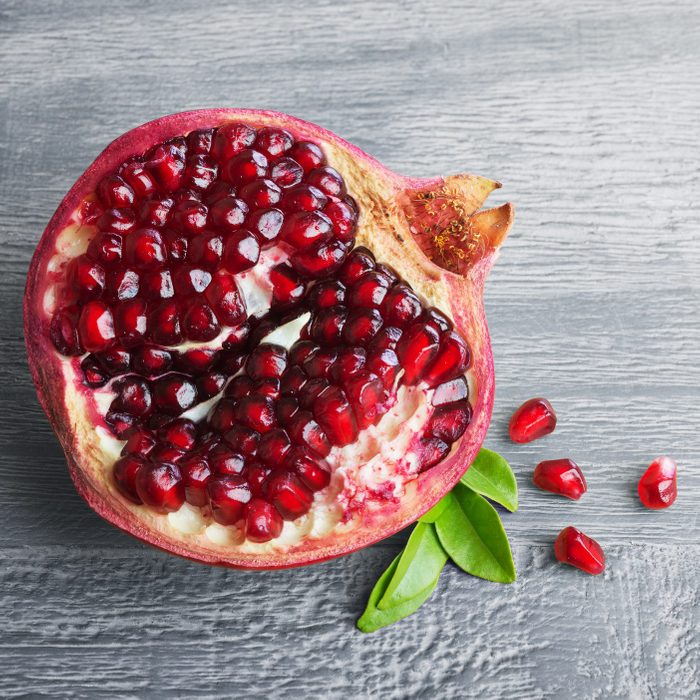 Half of s pomegranate fruit with seeds
