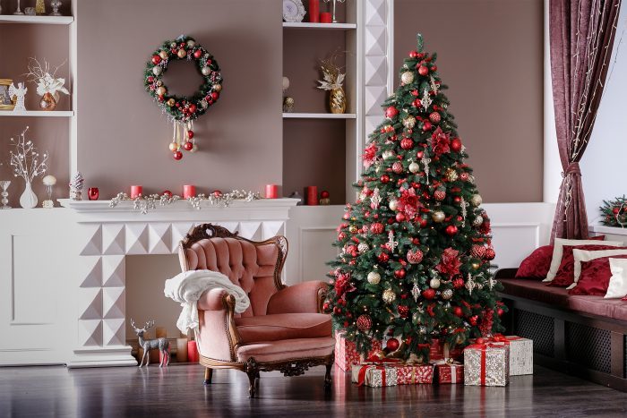 Image of chimney and decorated Christmas tree with gift