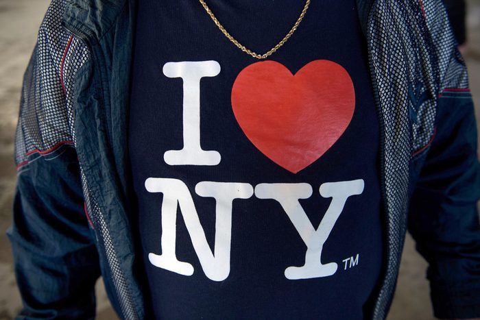 close up of man wearing an "I love NY" shirt