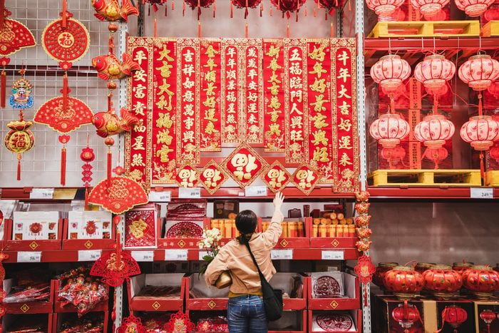 woman shopping for Chinese New Year decoration