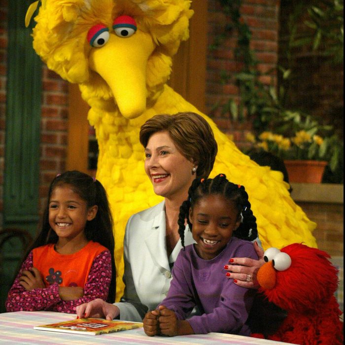 First Lady Laura Bush Laughs With Big Bird (c) And