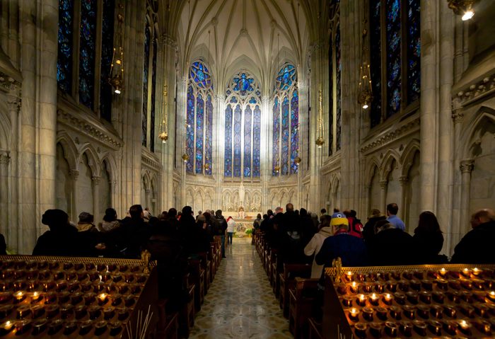Catholic worshipers attending the New Year's Eve Mass in New York's Saint Patrick's Cathedral
