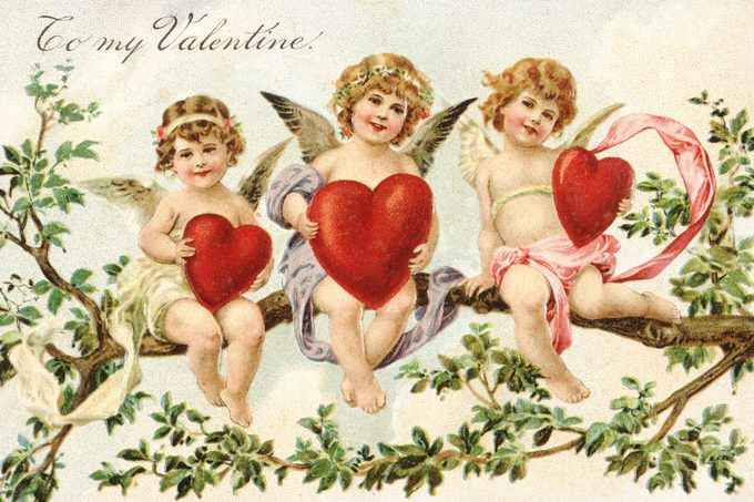 tarjeta vintage del día de san valentín con tres cupidos
