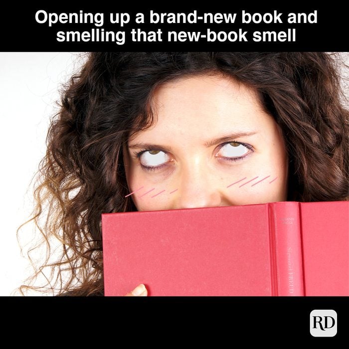 Opening Up A Brand New Book And Smelling That New Book Smell 
