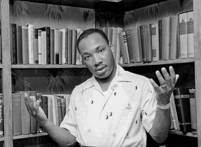 Martin Luther King Jr. in his home library.