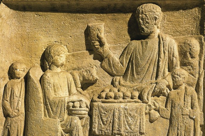 Roman civilization relief carving portraying a feast