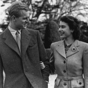 24th November 1947: Princess Elizabeth and The Prince Philip, Duke of Edinburgh enjoying a walk during their honeymoon at Broadlands, Romsey, Hampshire. (Photo by Topical Press Agency/Getty Images)