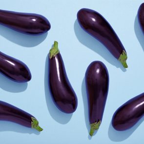 eggplants on blue background