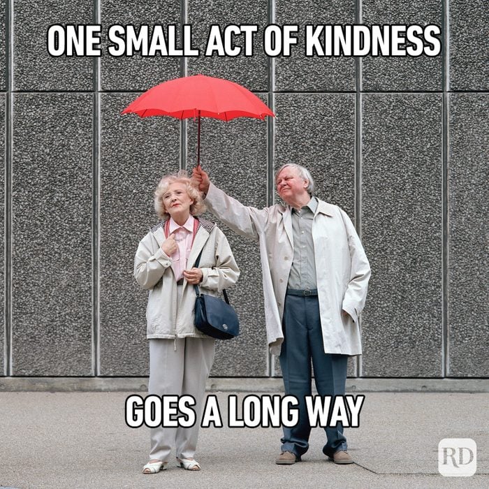 Man holding umbrella for woman. Meme text: One small act of kindness is one giant leap for humanity