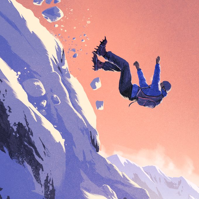 person falling backwards off of a snowy mountain
