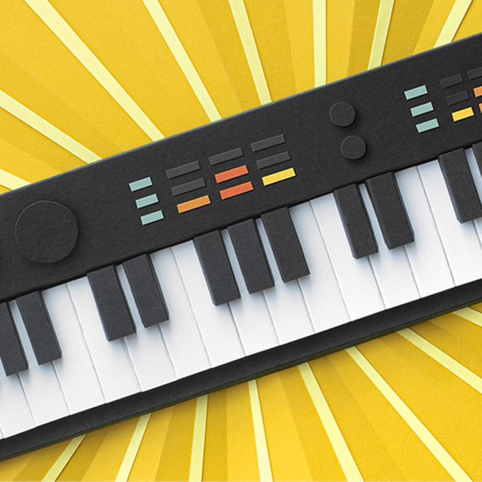 piano keyboard on yellow graphic