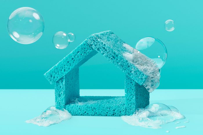 teal house made out of sponges with bubbles all around on teal background