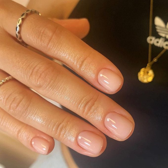 Beautiful Skin With Barely There Polish Nails