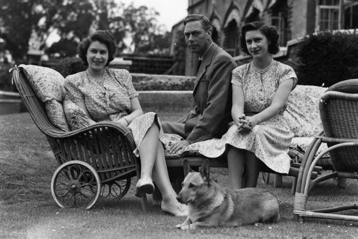 George VI (1895 - 1952), king of Great Britain, with his two daughters, Princess Elizabeth, left, and Princess Margaret Rose (1930 - 2002), at the Royal Lodge at Windsor. (Photo by Lisa Sheridan/Getty Images)