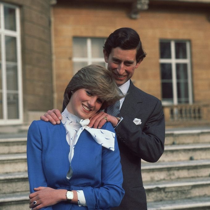 Prince Charles and Lady Diana Spencer pose for photographers at Buckingham Palace after the announcement of their engagement. (Photo by © Hulton-Deutsch Collection/CORBIS/Corbis via Getty Images)