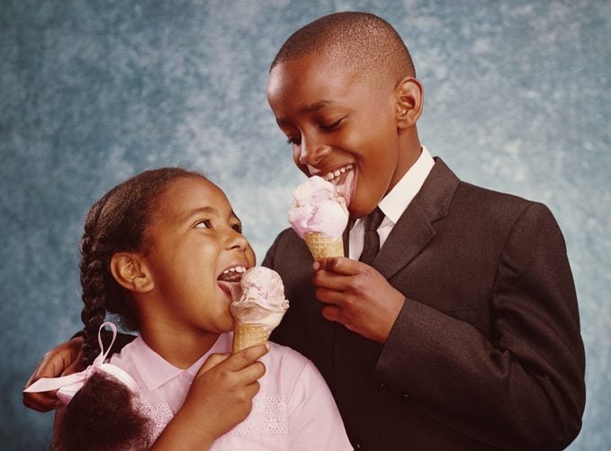 boy and girl enjoying Ice Cream Cones