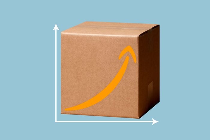 between two axis of a graph is a cardboard box with the amazon arrow pointing up to indicate a price increase for amazon prime