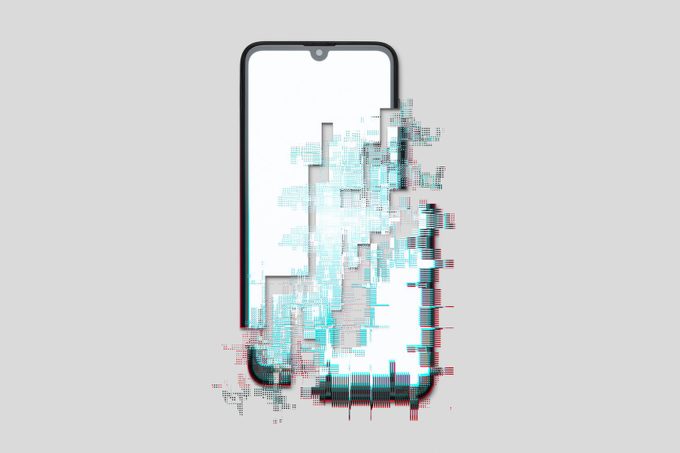 photo illustration of a smartphone ripped apart by a glitch effect