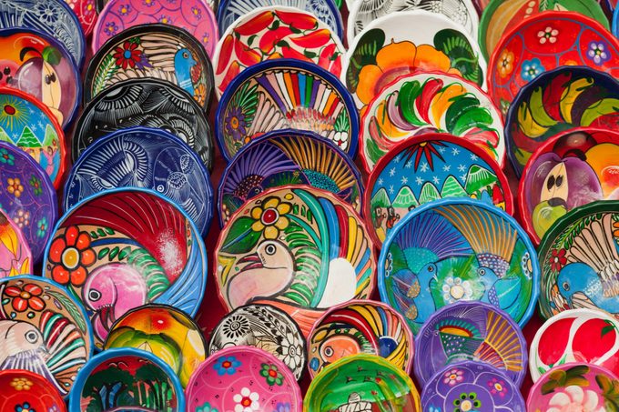 Colorfully painted plates and bowls, Chichen Itza, Mexico