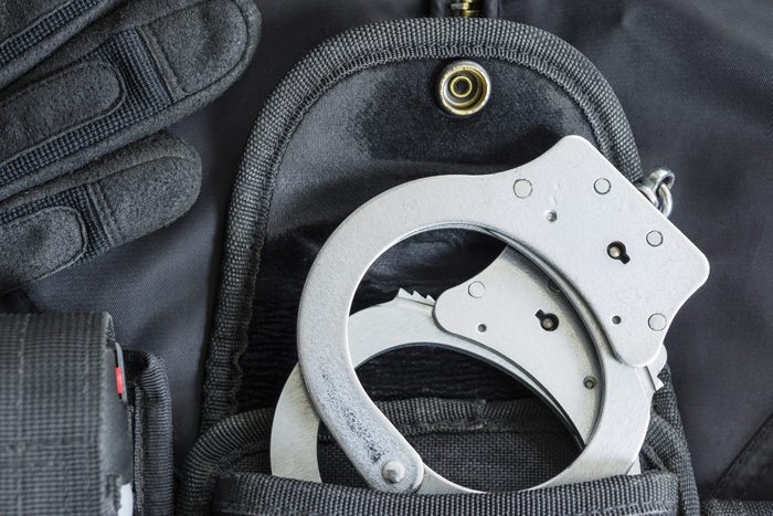 close up of handcuffs in a black pocket