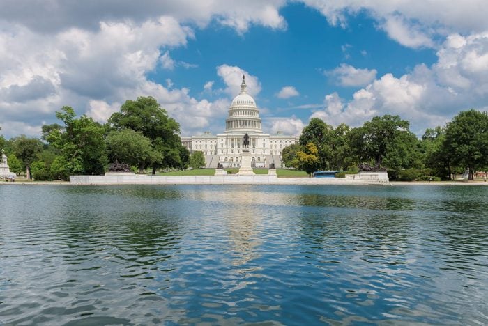 The United States Capitol Building in Washington DC with a view of the water in front