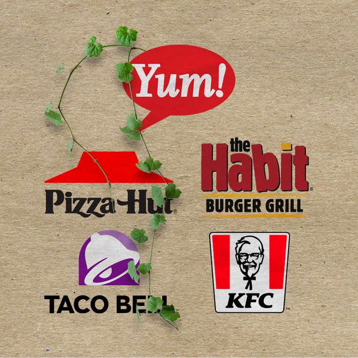 Yum Brand's fast food logos with vines growing out on a kraft paper background