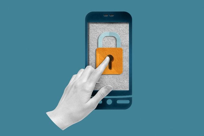Papercraft smartphone with locked padlock and female hand touching the screen on a teal background