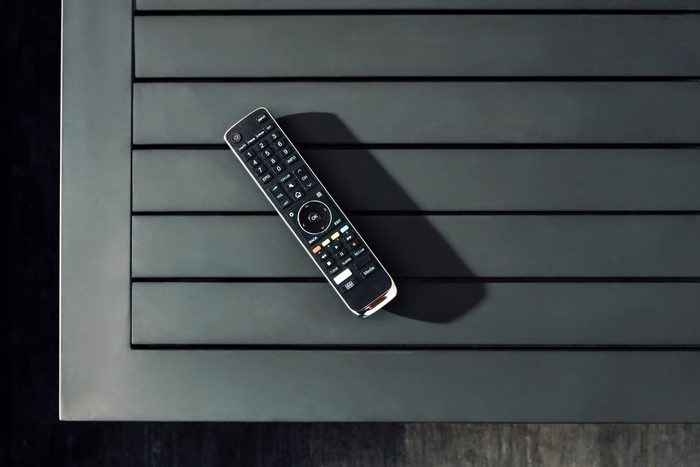 Tv Remote Control on black coffee table