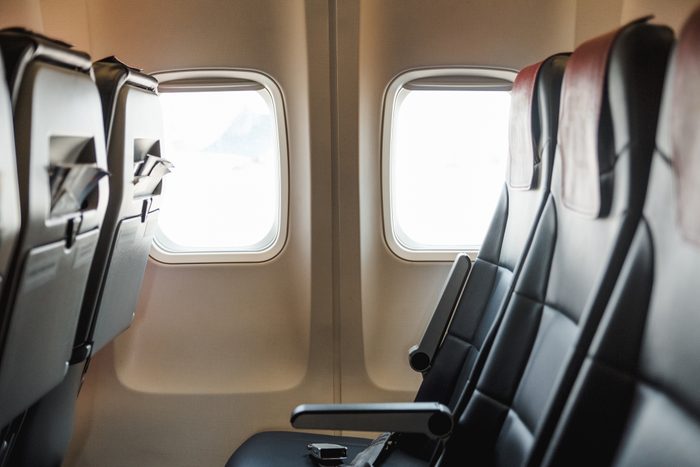 seats and a window inside the aircraft